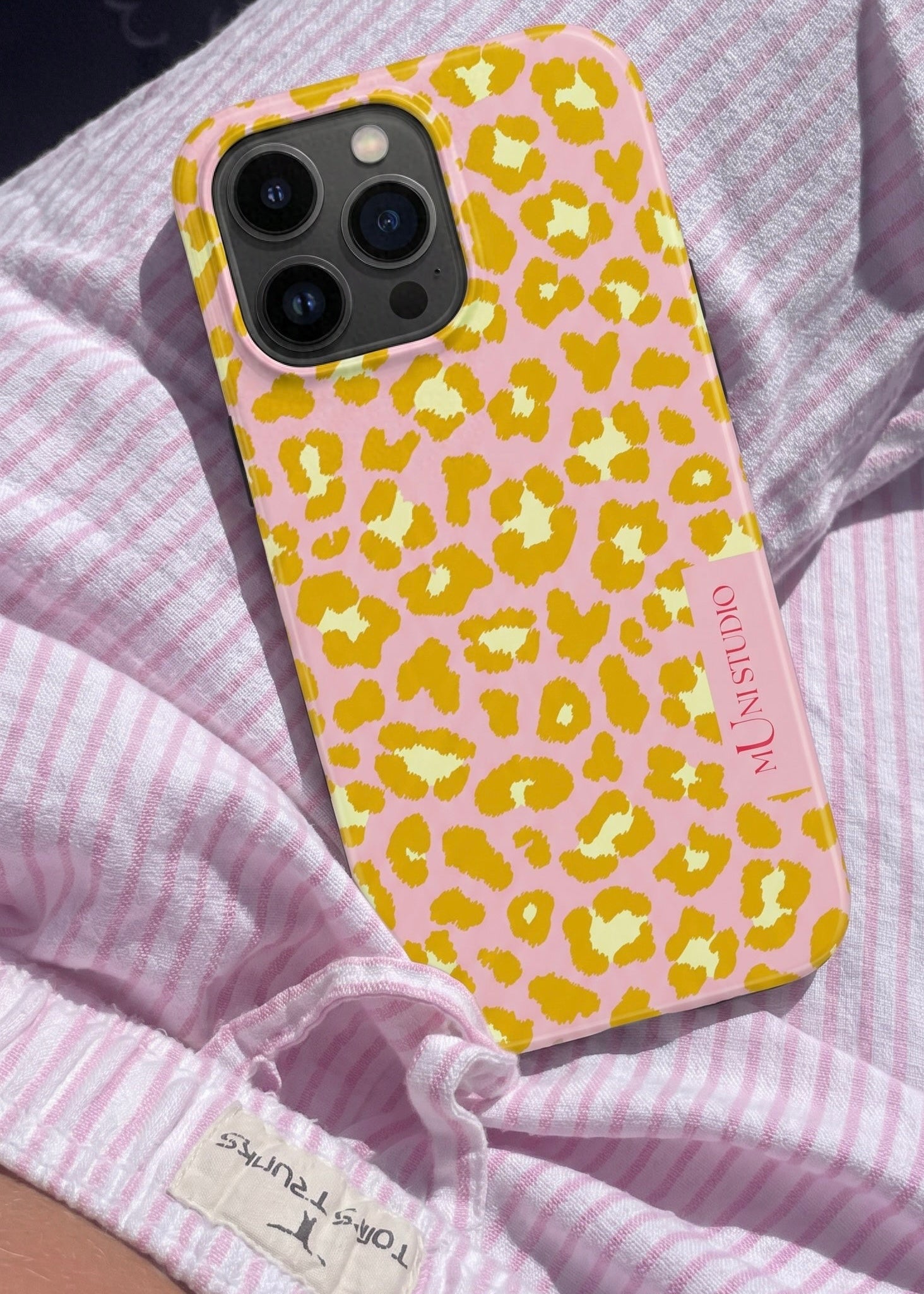 Muni Studio GOLDEN RAWR Tough Phone Case – hand held view