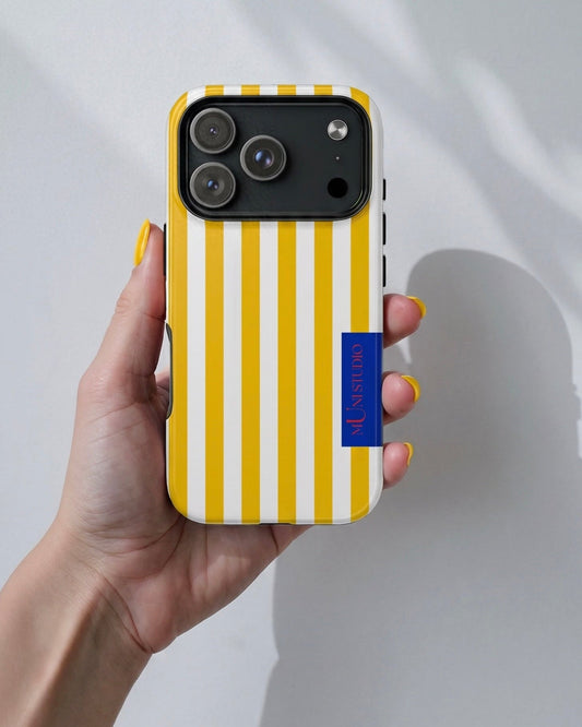 Muni Studio Lemon Cake tough case for iPhone, glossy finish, lifestyle photo
