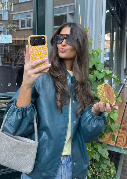 Muni Studio GOLDEN RAWR Tough Phone Case – lifestyle shot