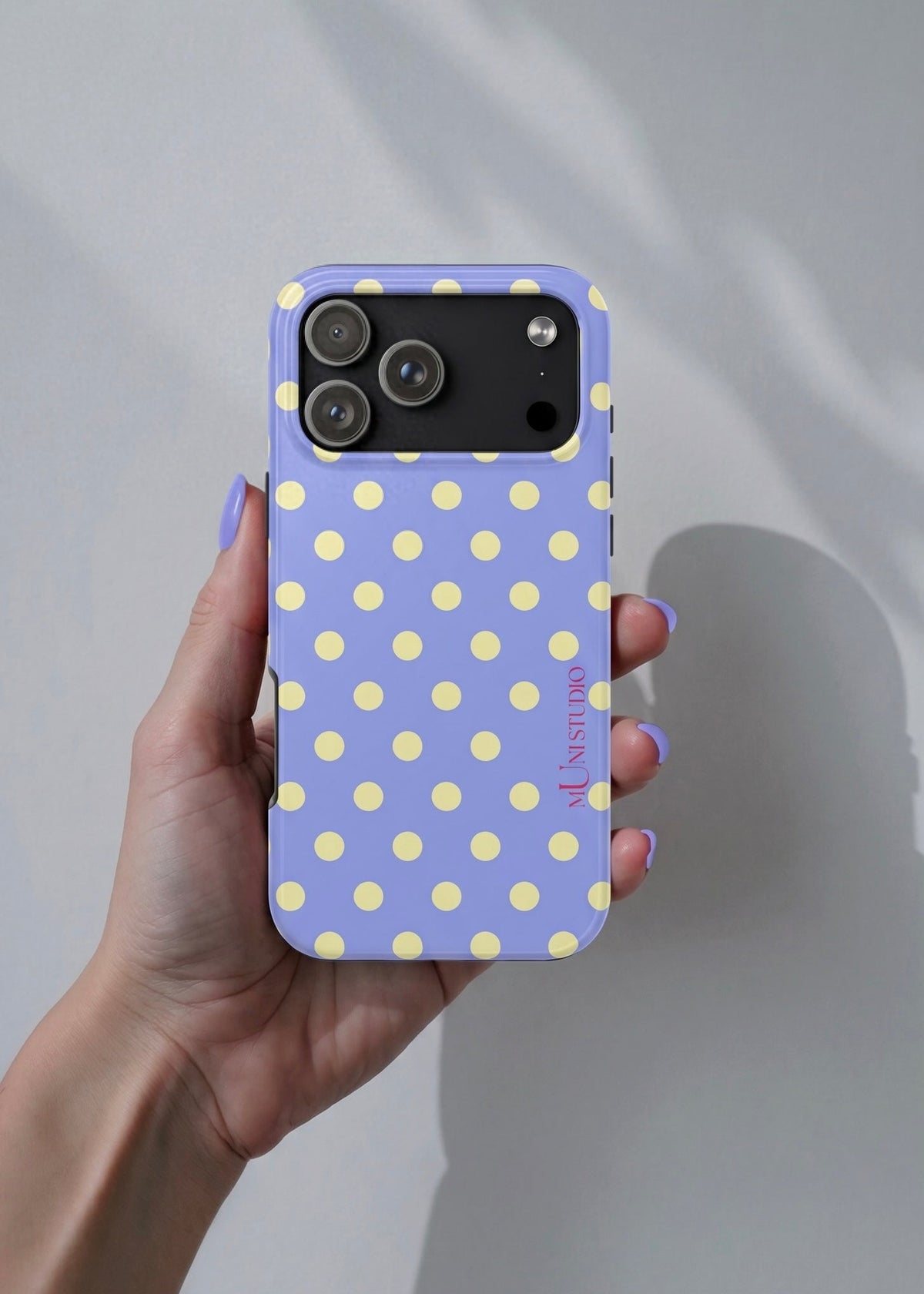 Muni Studio Butter Polka Tough Phone Case – lifestyle photo